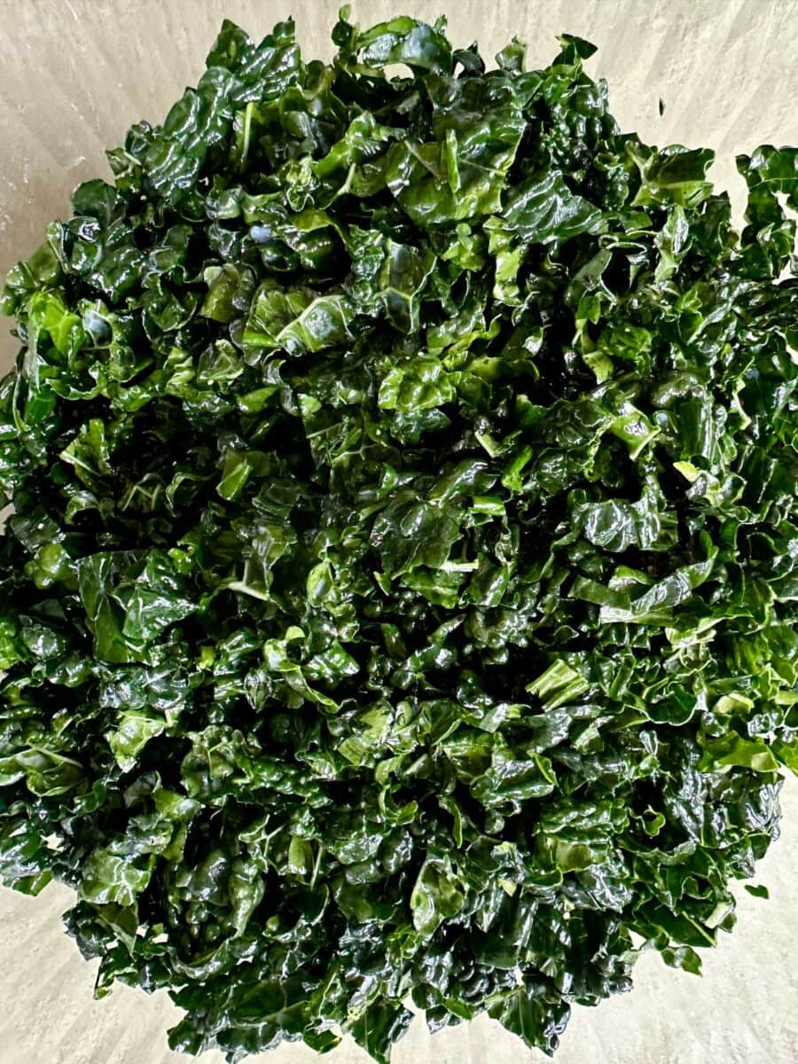 Thinly ribboned kale tossed with salt, pepper, and olive oil.